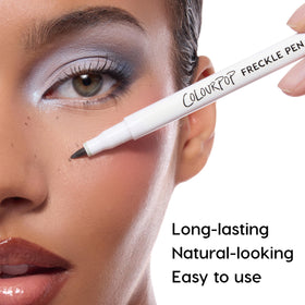 ColourPop freckle pen swatch on skin showing buildable soft brown color payoff