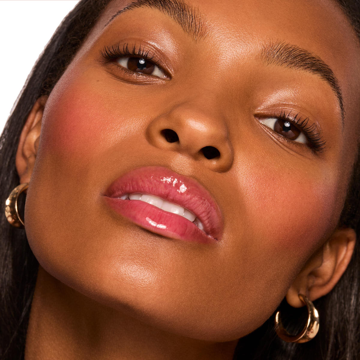 ColourPop open cap close-up of balm texture and glossy cushion