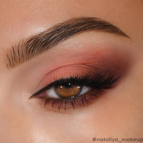 ColourPop palette in use on eyelid demonstrating layered shimmer for long-lasting wear