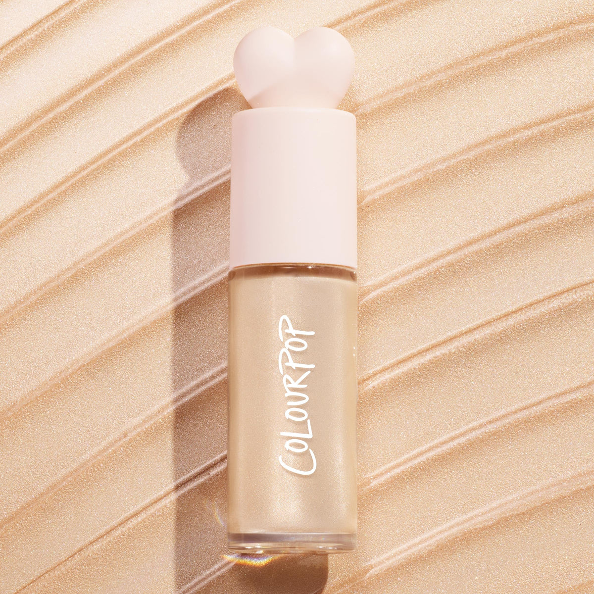 Close-up pearl sheen of ColourPop Hi-Lite showing superfine reflective glow