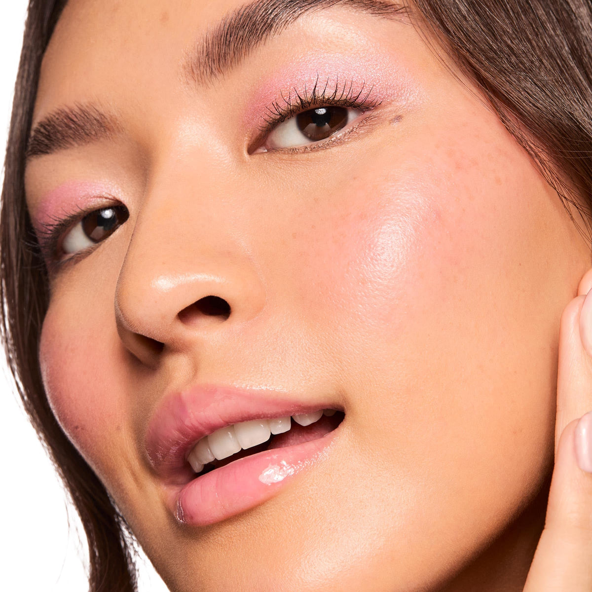 Close-up texture drop of ColourPop Hi-Lite showing luminous pearls