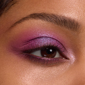 ColourPop applying shadow on eye demonstrating crease definition and lasting wear benefits