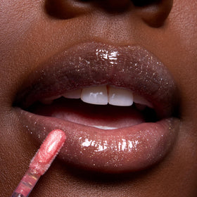 ColourPop open tube of Mademoiselle Belle gloss showing rosy pink formula and nourishing oils