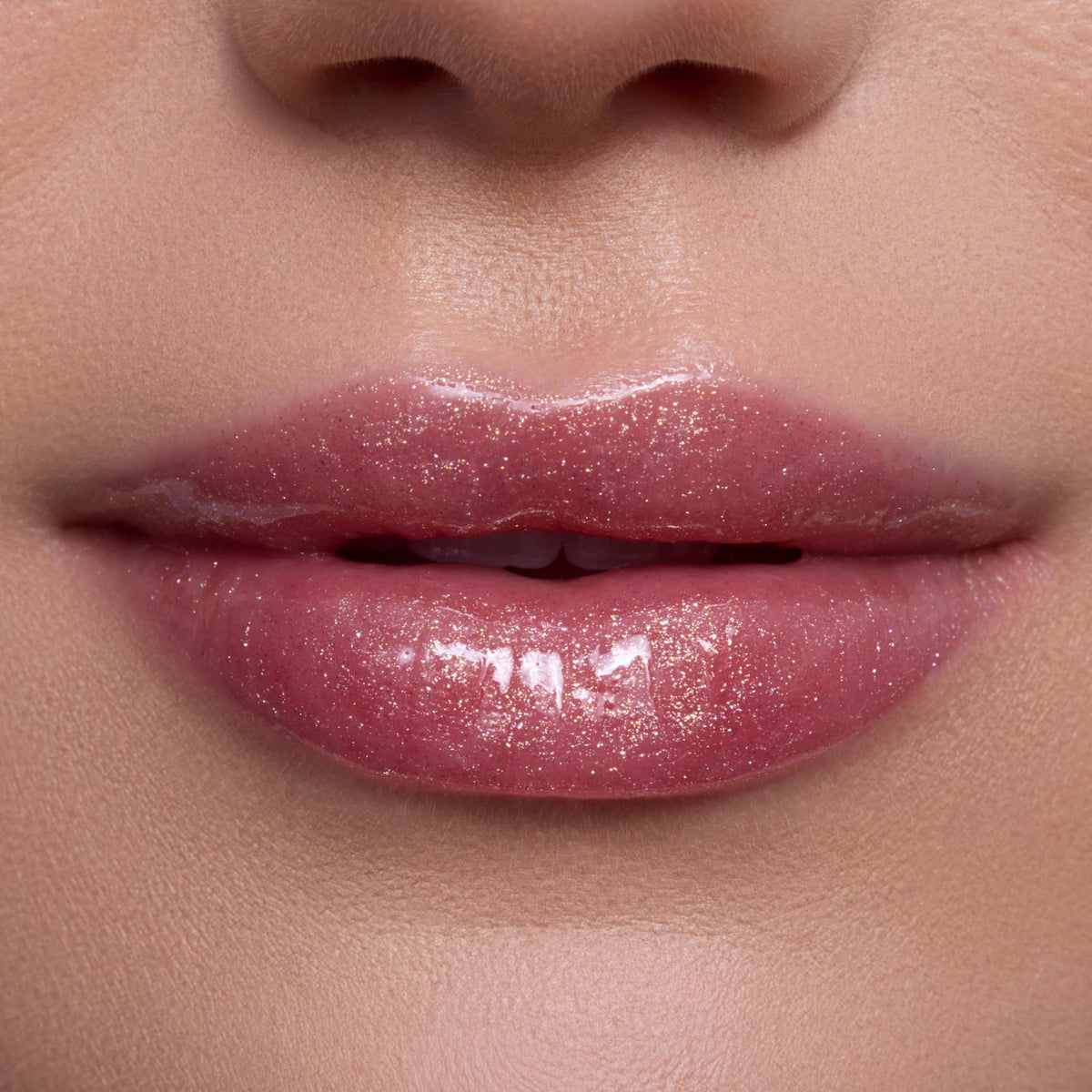 ColourPop texture swipe of Mademoiselle Belle on skin showing shimmer and hydrating finish