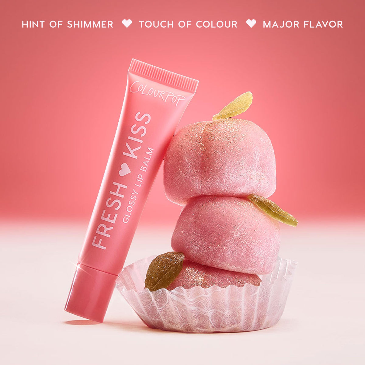 ColourPop Peach Mochi swiped on lips showing peach tint and plumping shine