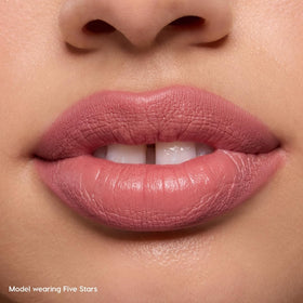 ColourPop swatches on arm showing creamy glide and high-pigment payoff