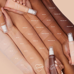 ColourPop droplet on skin highlighting hyaluronic acid and coconut water hydration benefits