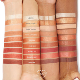 ColourPop swatches on arm displaying true-to-shade color and blendability for styling
