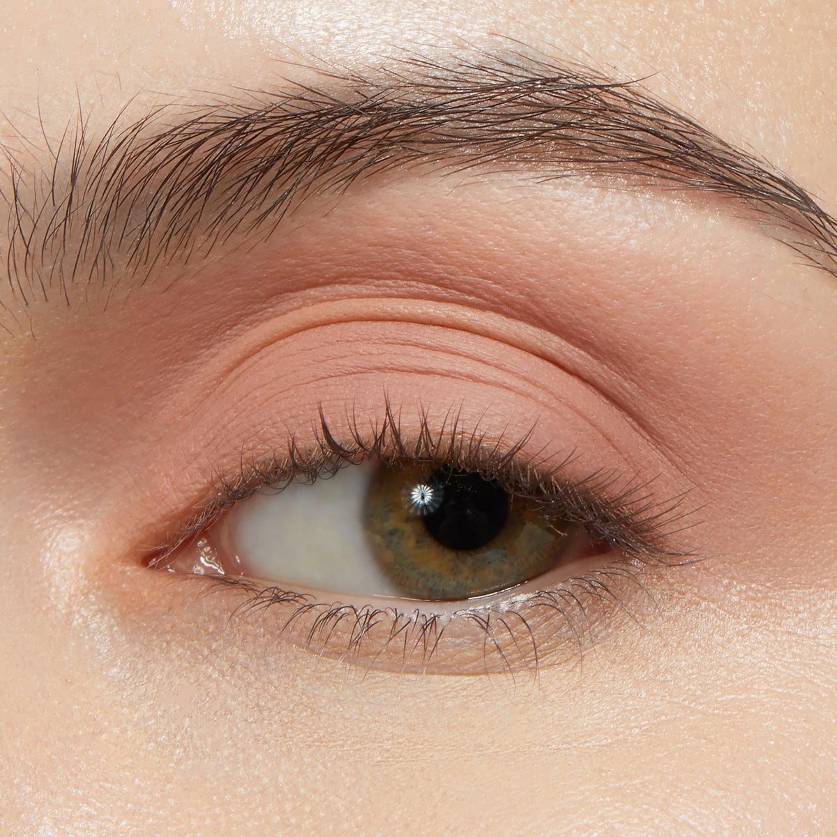 ColourPop Shadow Stix held in hand to show scale and convenience for on-the-go use