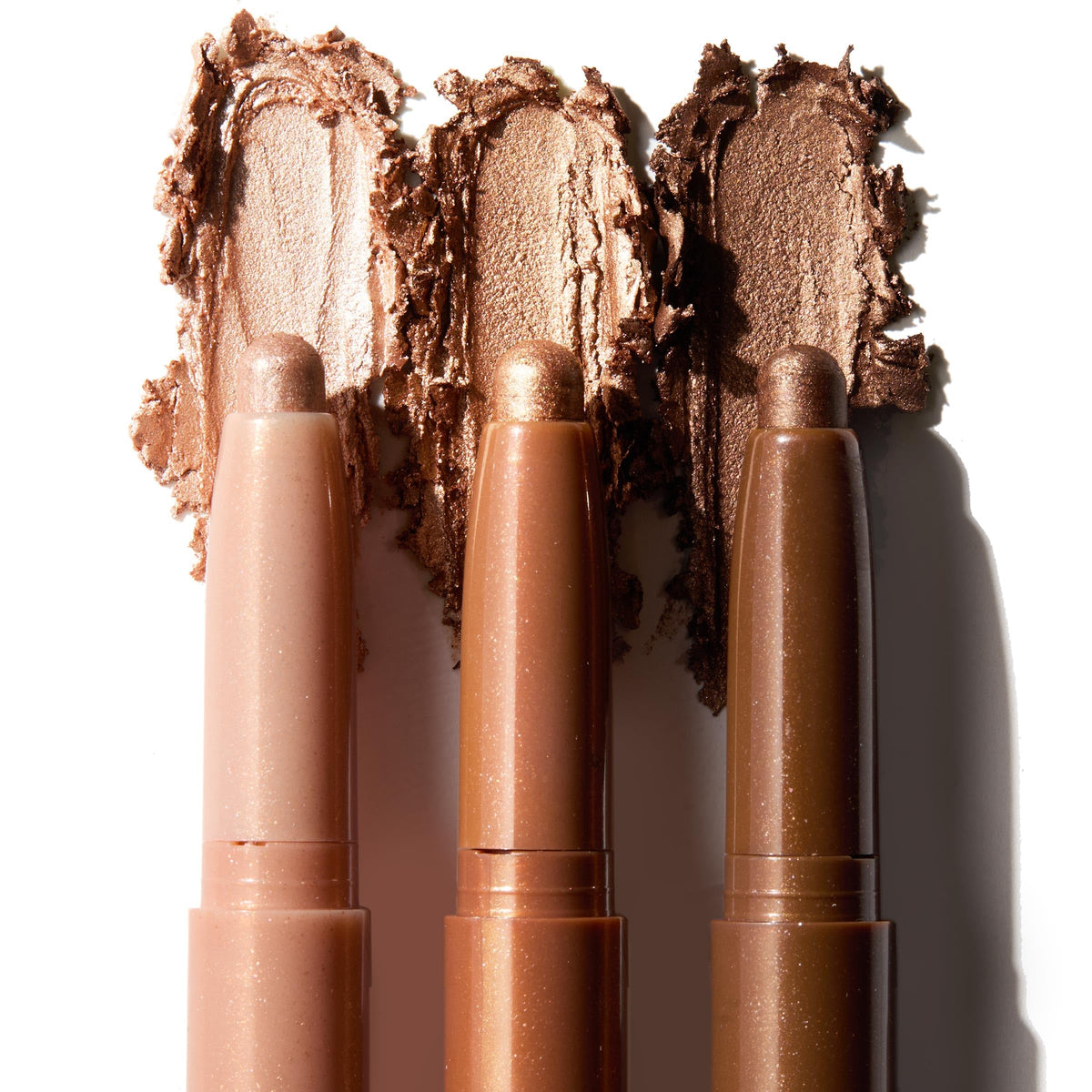 ColourPop three Shadow Stix laid flat displaying caps and labels for quick shade selection and portability