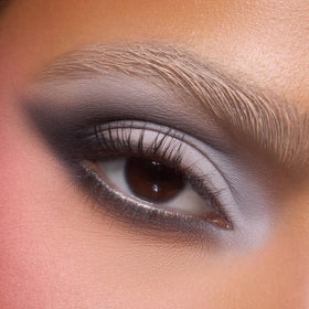 ColourPop matte powder swipe showing pigment density and crease-resistant application