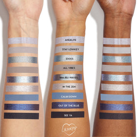 ColourPop swatches on arm showing true-to-pan blues and silvers