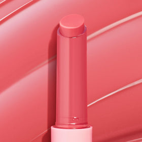 ColourPop lifestyle image of model wearing Guava Glaze with dewy benefit