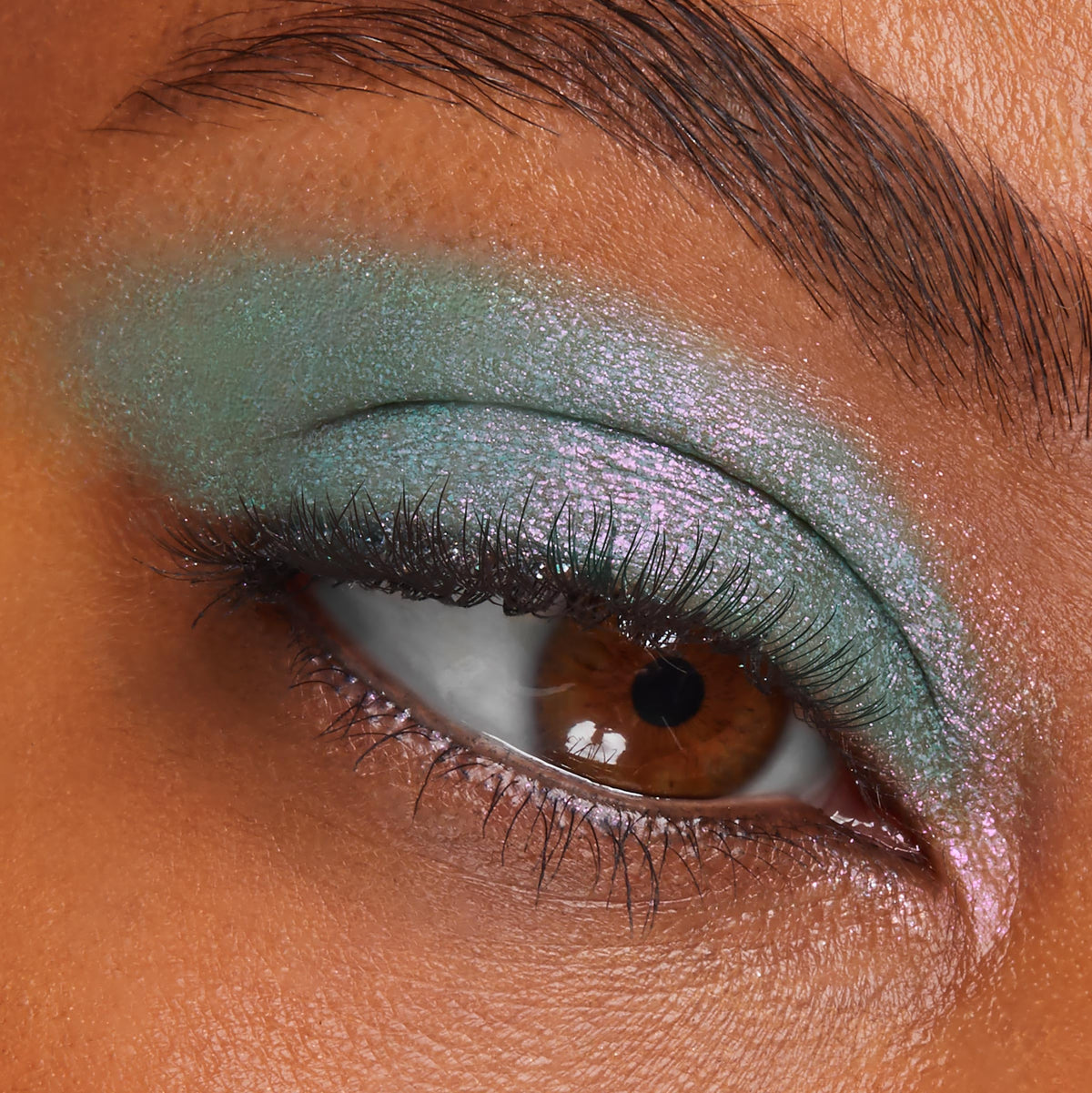ColourPop Solar Beam detail with flat synthetic brush showing precise application and control