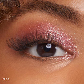 ColourPop Frog texture close-up showing icy baby pink sparkle and blendable finish benefit
