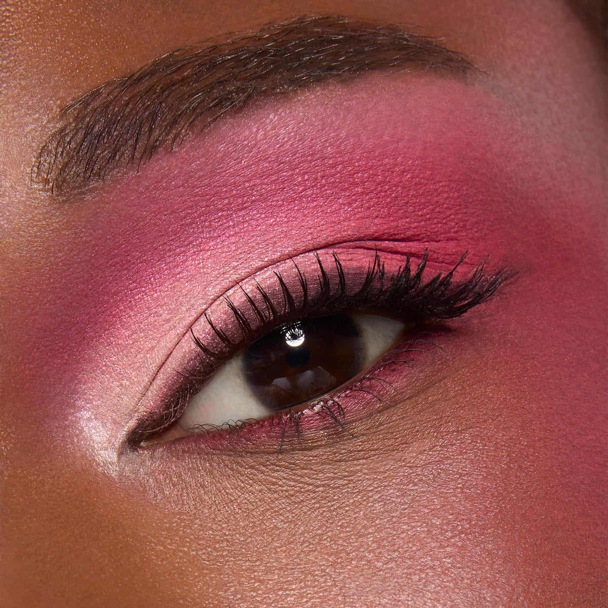 ColourPop model wearing palette shades on eyes illustrating blendable color payoff