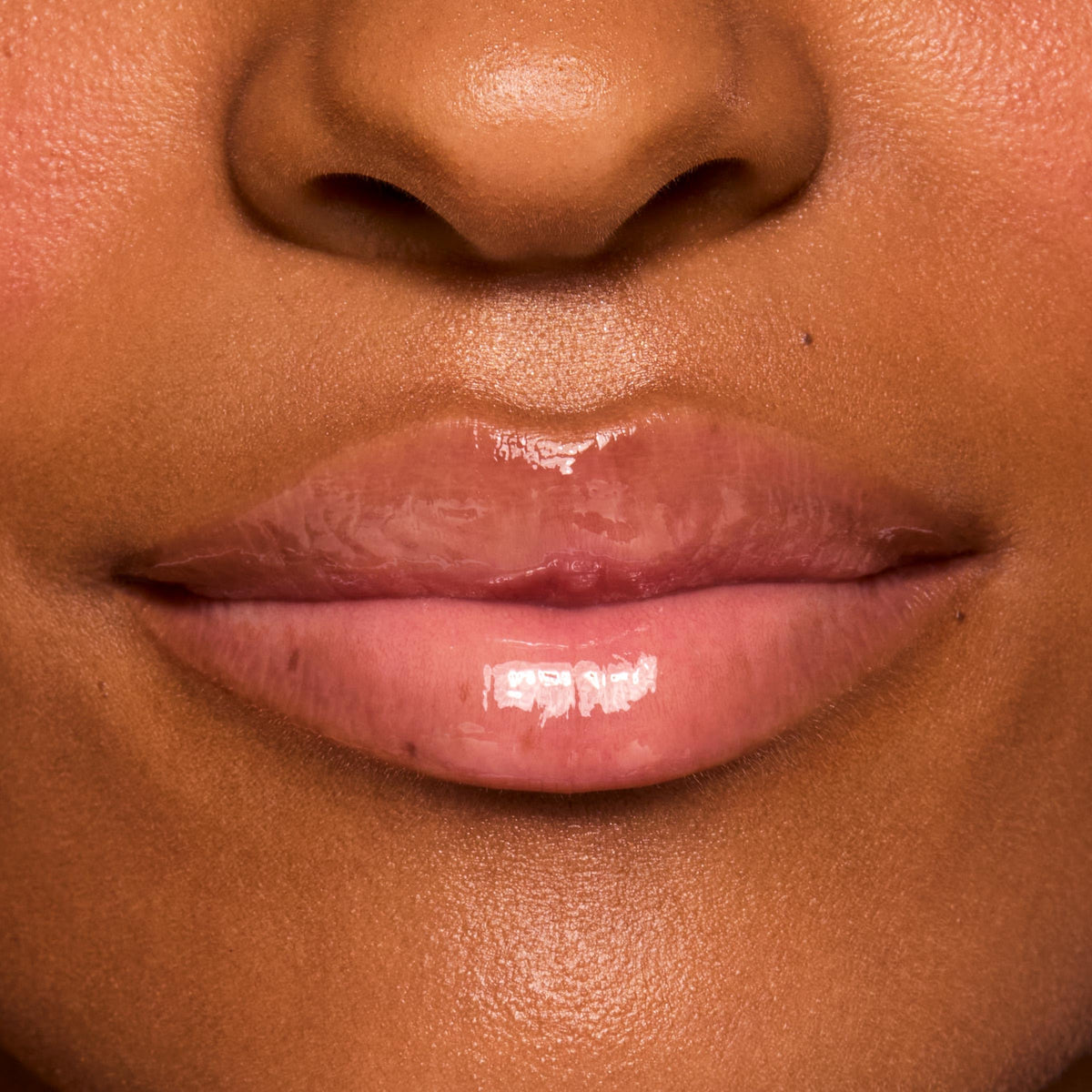 ColourPop swatch on skin showing sheer vanilla tint and immediate hydration benefit
