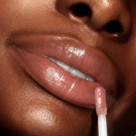 ColourPop gloss texture swirled on skin highlighting glossy, hydrating finish