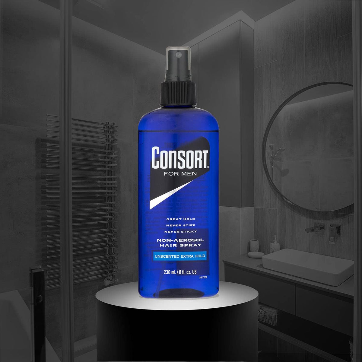 Consort in-use on model styling hair for lasting all-day hold