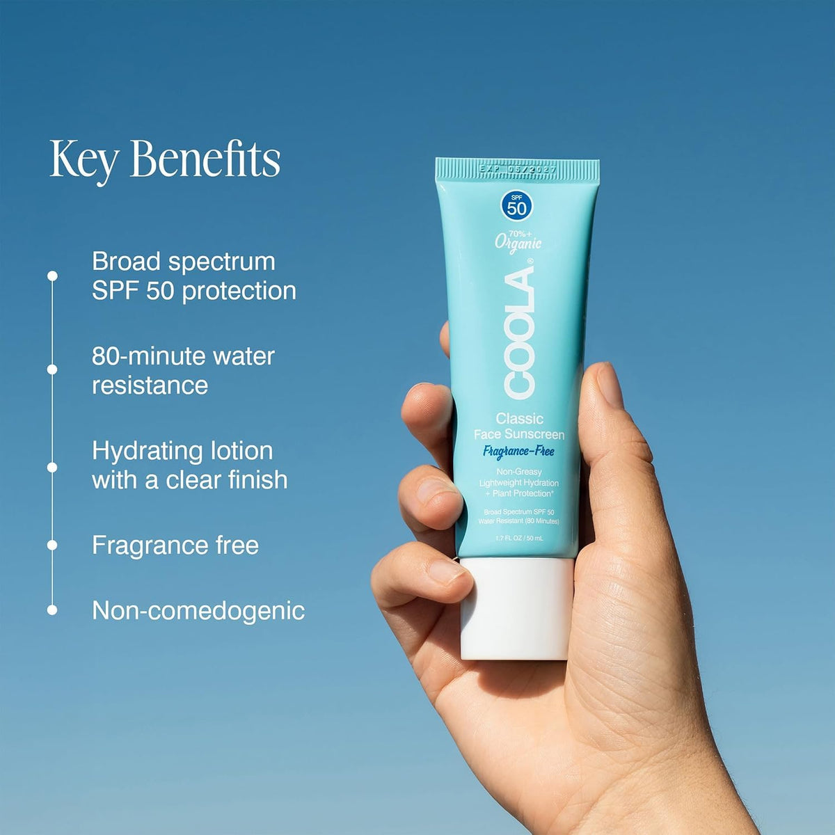 COOLA tube next to a smartphone illustrating 1.7 fl oz portability benefit