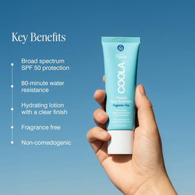COOLA tube next to a smartphone illustrating 1.7 fl oz portability benefit