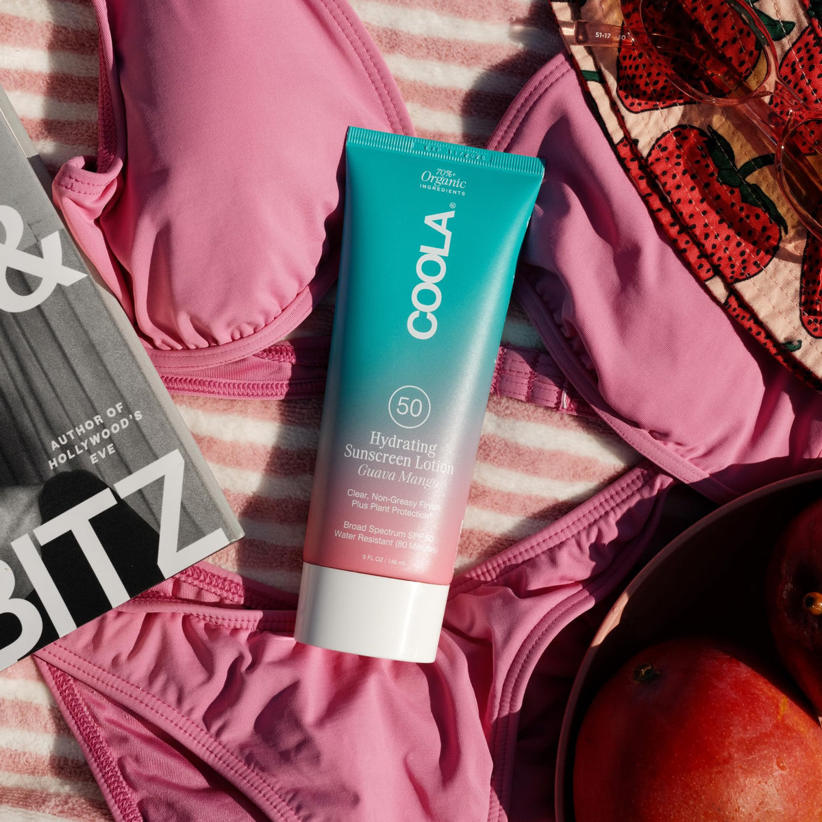 COOLA in a beach setting promoting long-day outdoor protection benefit