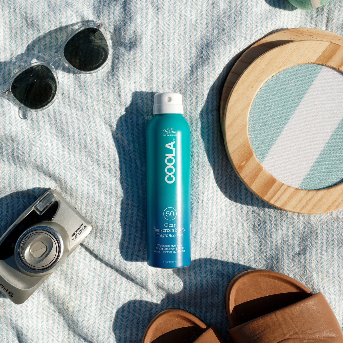 COOLA bottle label detail highlighting reef-compliant ingredients