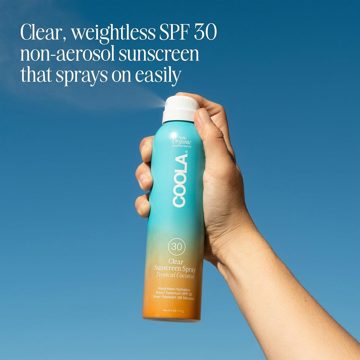 COOLA continuous spray nozzle misting upside down for full coverage benefit
