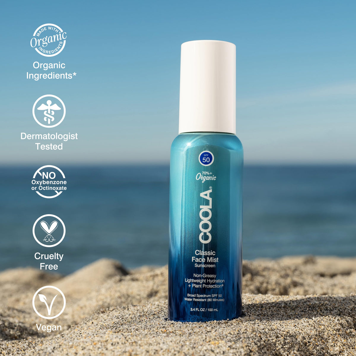 COOLA face mist next to a phone and keys to show 3.4 fl oz portable size benefit
