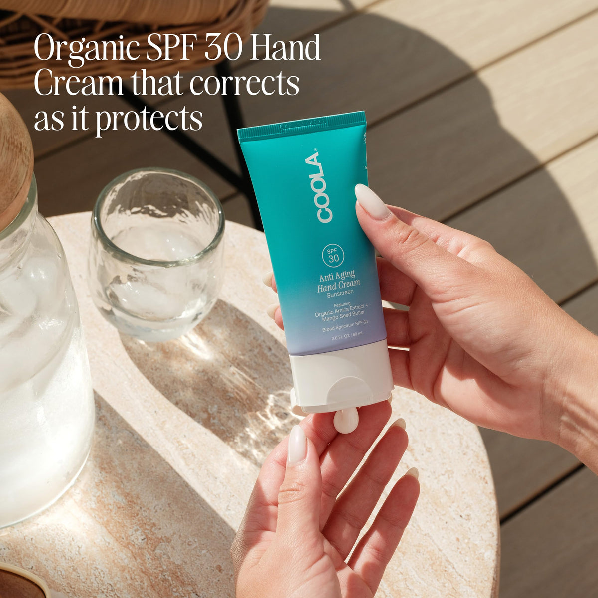 COOLA cream texture close-up showing rich hydration