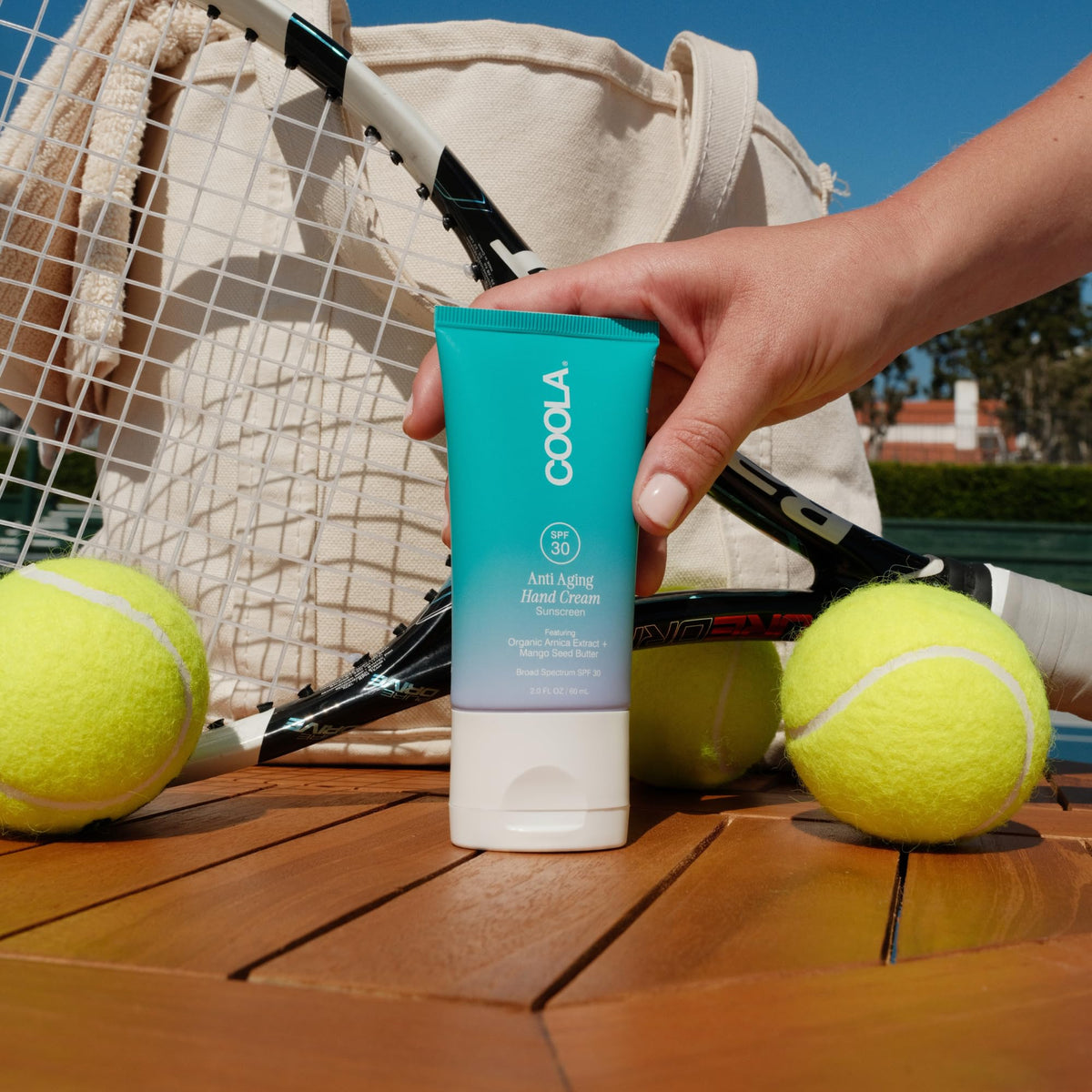 COOLA cap and tube detail illustrating leak-resistant packaging