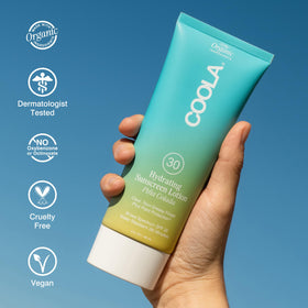 COOLA label close-up showing ingredients and reef-friendly claim