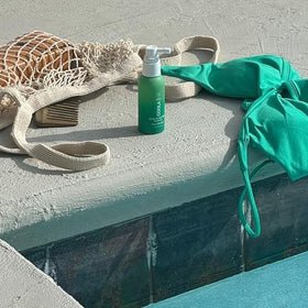 COOLA label highlighting organic ingredients and reef-compliant certification
