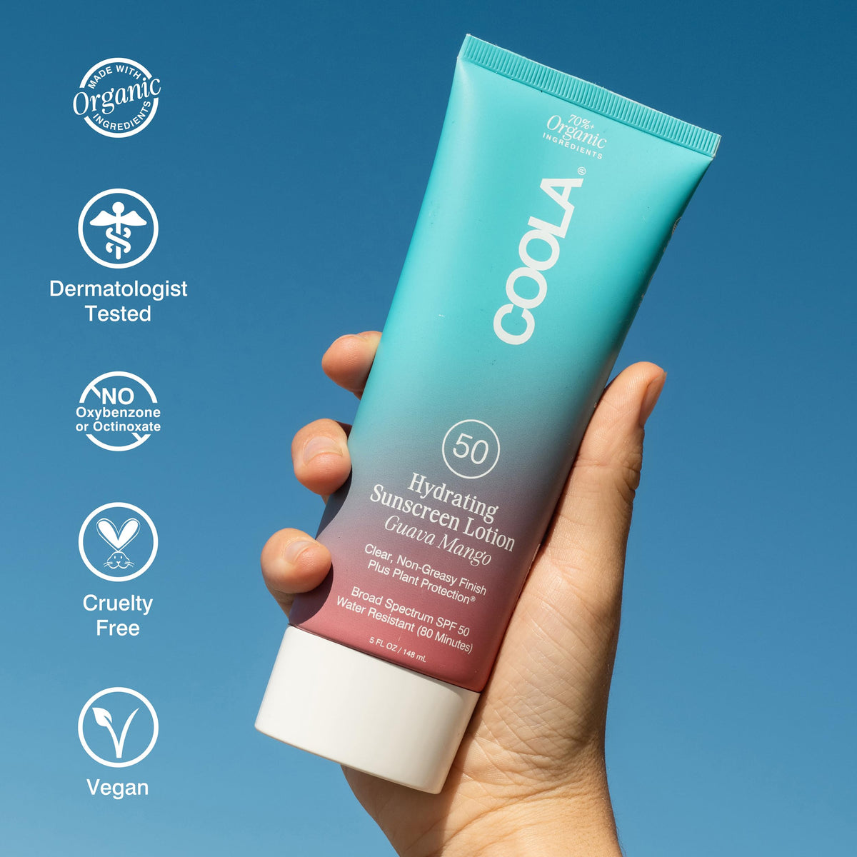 COOLA label close-up highlighting plant-derived and reef-friendly ingredients benefit