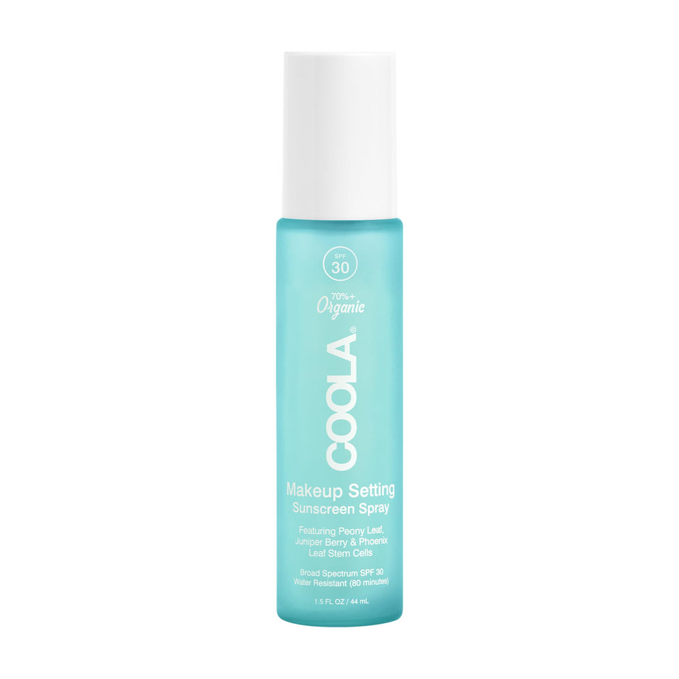 COOLA setting spray front view shows compact bottle and SPF protection