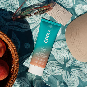 COOLA applied on arm demonstrating smooth, non-greasy finish benefit