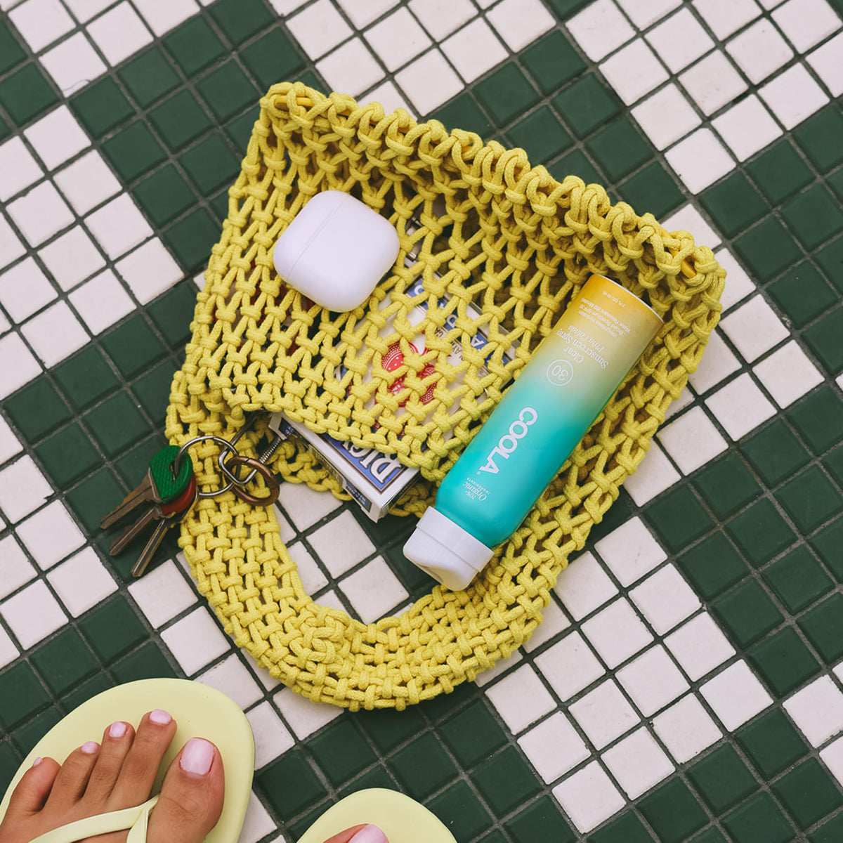 COOLA close-up of lightweight spray texture for fast absorption benefit