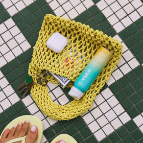 COOLA close-up of lightweight spray texture for fast absorption benefit