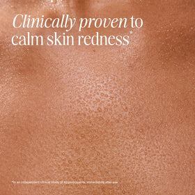 COOLA mist applied to shoulder illustrating soothing after sunburn relief