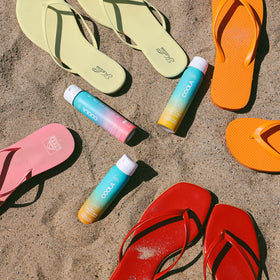 COOLA in use at the beach demonstrating practical protection during activities