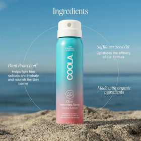 COOLA on a beach towel lifestyle image showing outdoor protection during activities