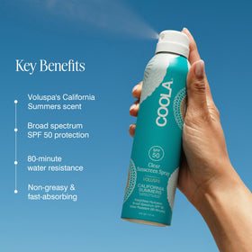 COOLA sunblock in hand during application for even coverage