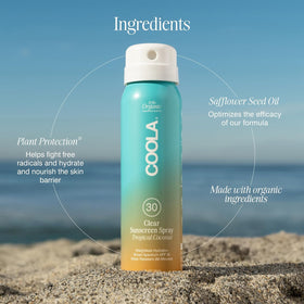 COOLA bottle on a beach towel illustrating lifestyle use and outdoor protection