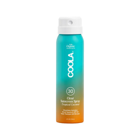 COOLA front packaging showing SPF 30 spray and tropical coconut branding for travel convenience