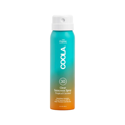 COOLA front packaging showing SPF 30 spray and tropical coconut branding for travel convenience