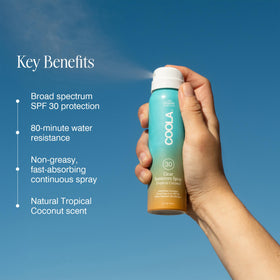 COOLA continuous spray misting onto arm demonstrating quick, even application benefit