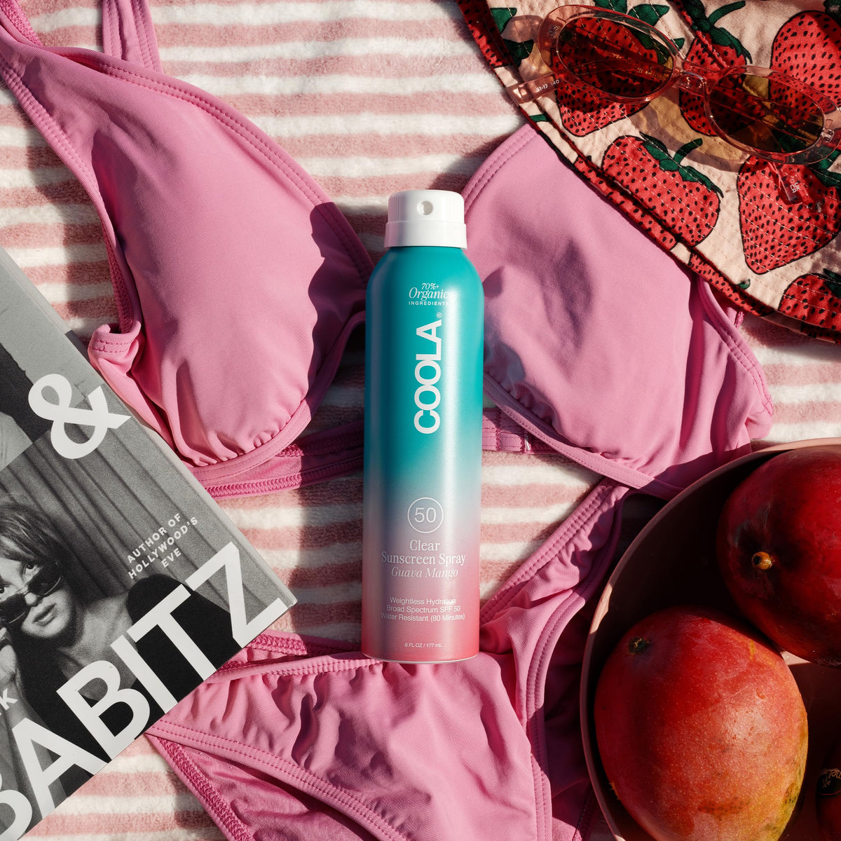 COOLA mist on forearm revealing ultra-sheer texture and fast absorption benefit
