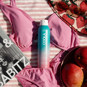 COOLA mist on forearm revealing ultra-sheer texture and fast absorption benefit