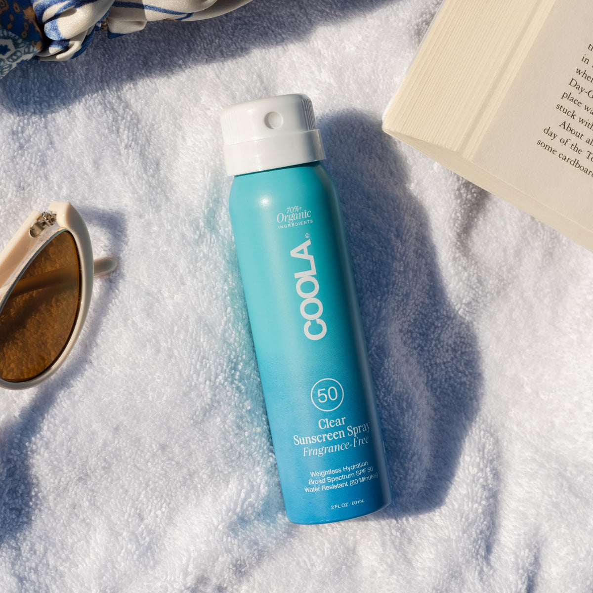 COOLA close-up mist and texture demonstrating lightweight, non-greasy finish