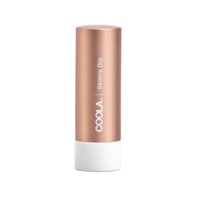 COOLA tinted Liplux Skinny Dip front tube showing shade and label, offering SPF protection
